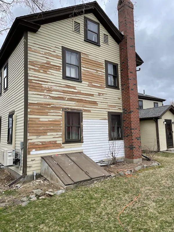 a house that is being painted white